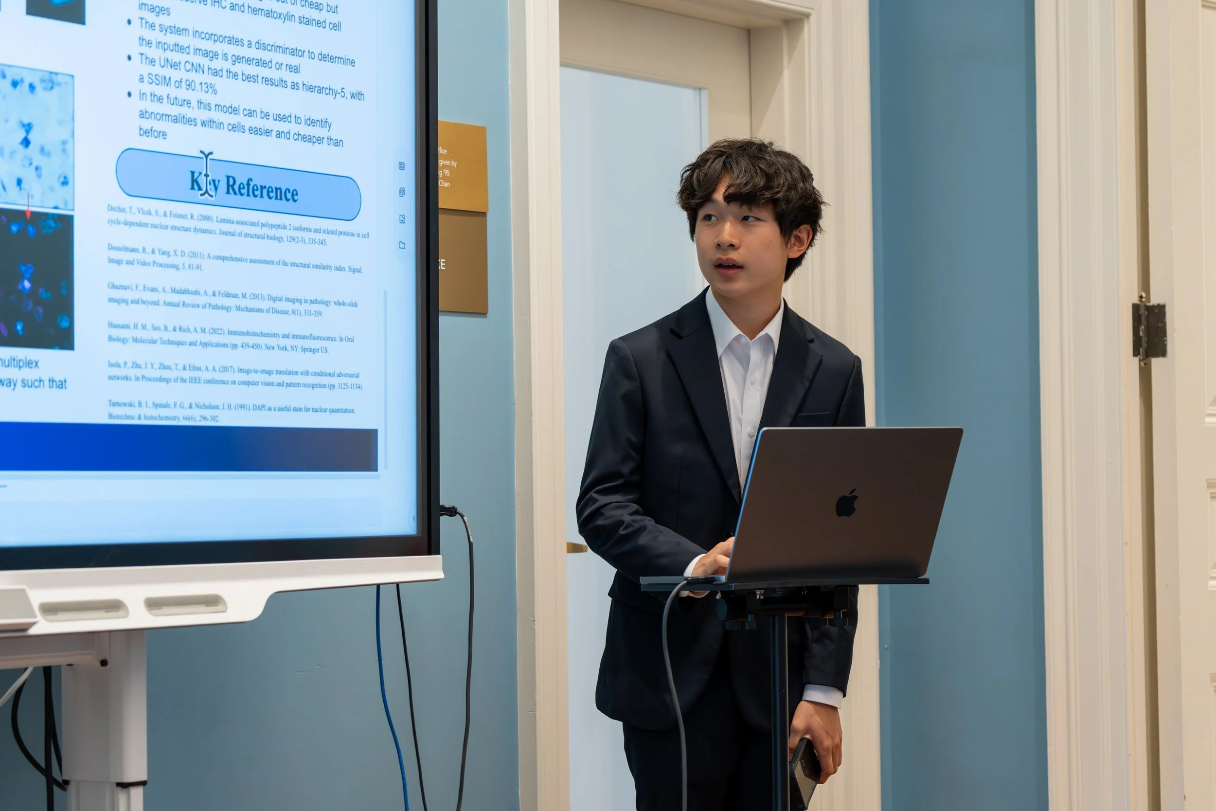 A Papers scholar presenting their research